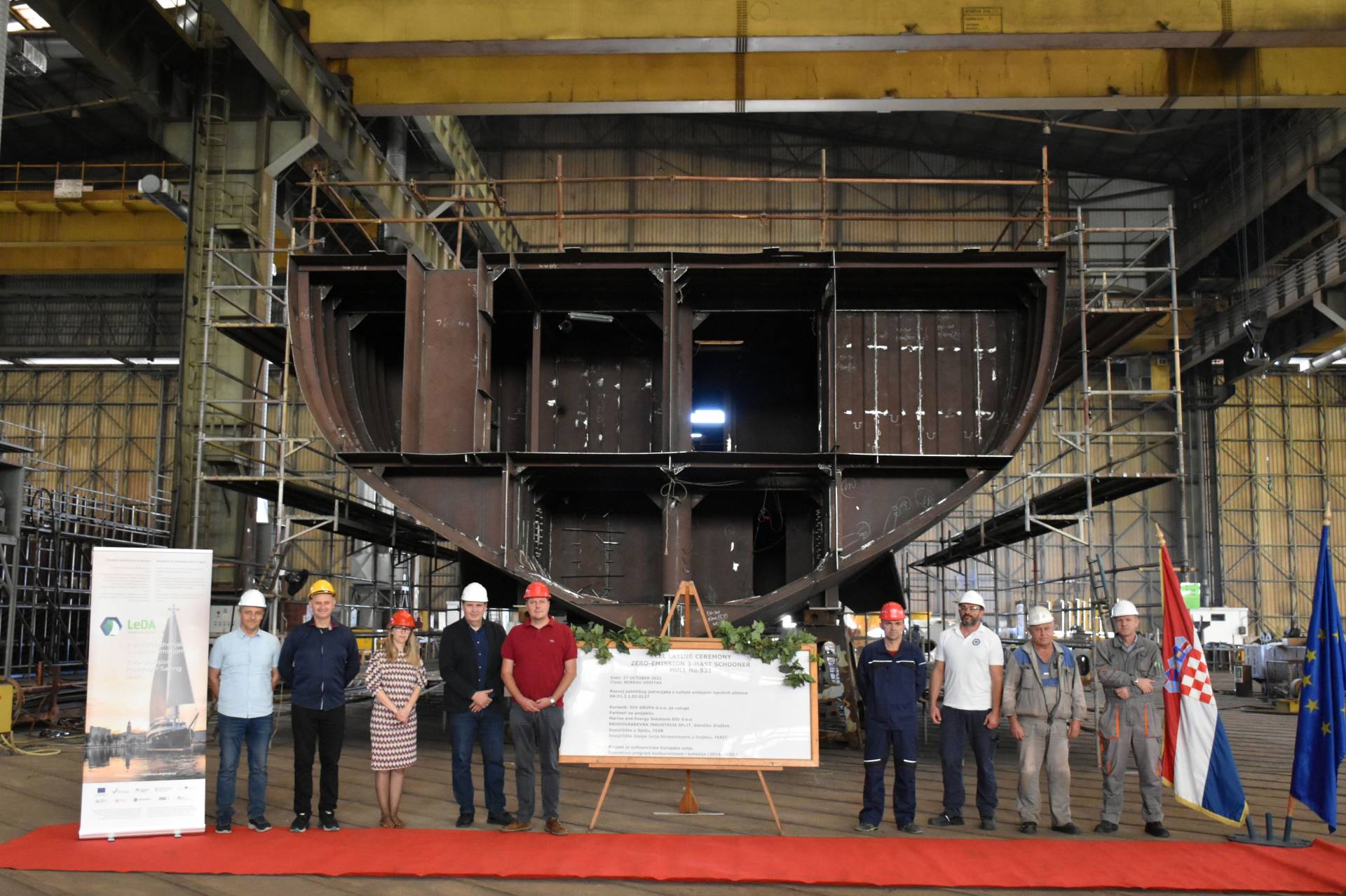 Keel Laying For A Zero Emission Passenger Sailing Ship. The keel-laying of the zero-emission passenger sailing ship with electric motors as the main drive, took place at the Brodosplit shipyard  (Image at LateCruiseNews.com - October 2022)